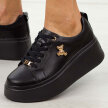 Czarne skórzane sneakersy damskie na platformie Filippo Dp6246/25